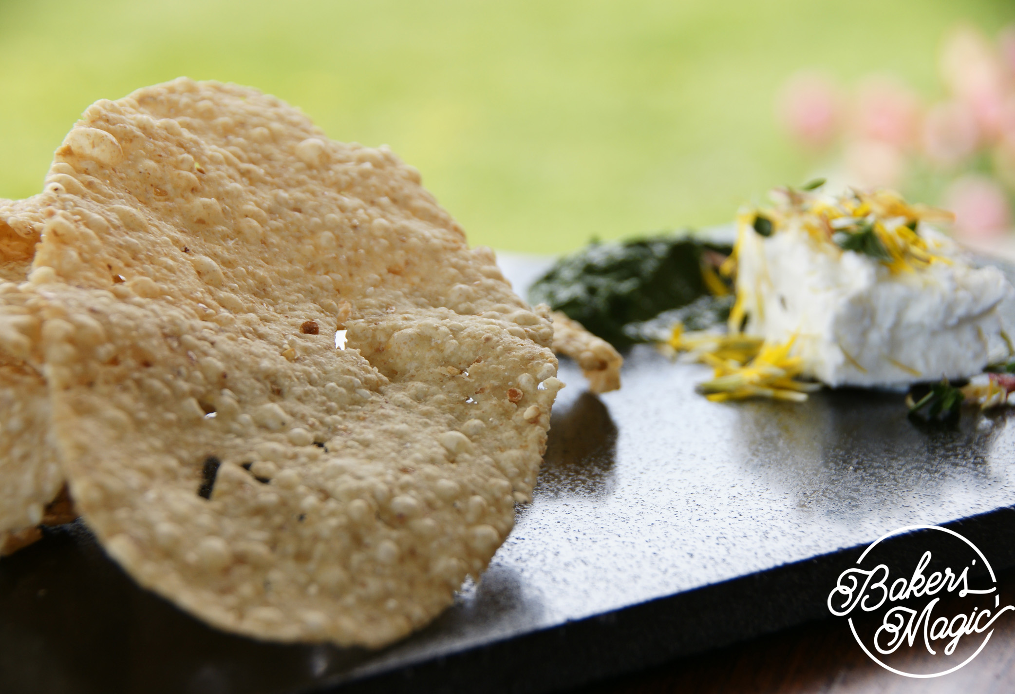 Flaxseed crisps with Meredith Dairy goat cheese and nettle puree
