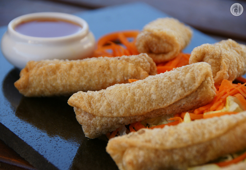 Deep fried little rolls ready to eat with sweet chilli sauce