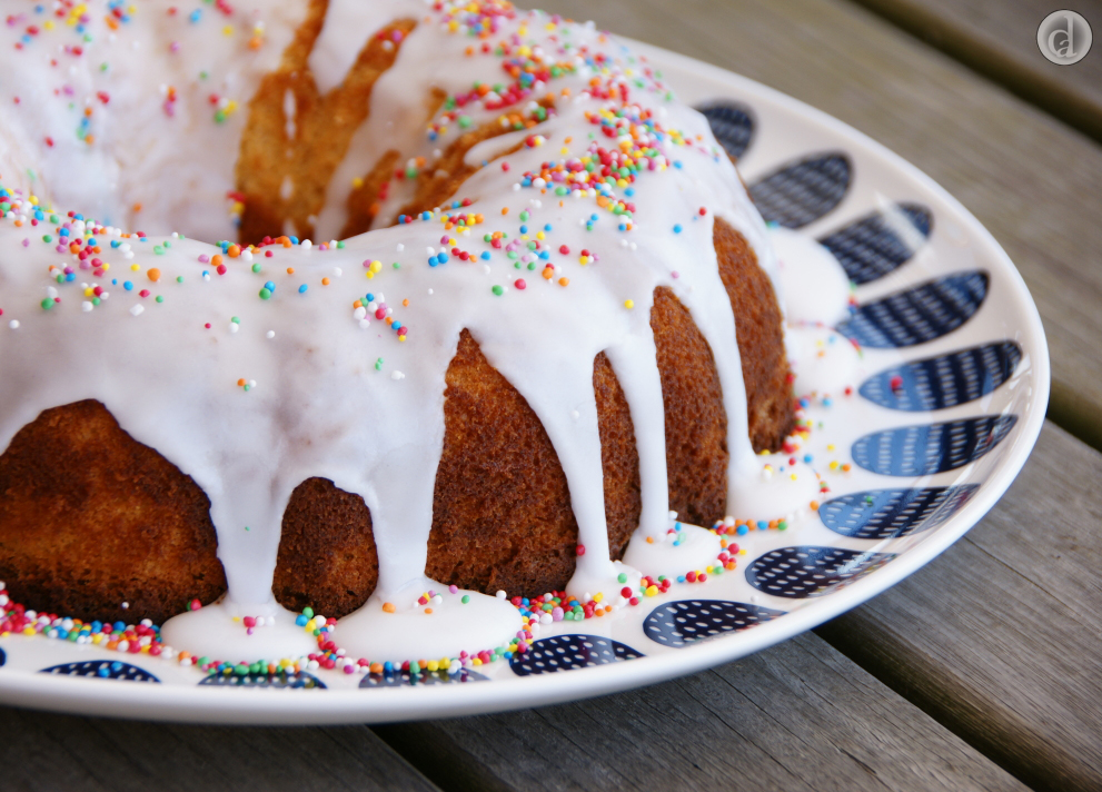 With plain icing & a few sprinkles