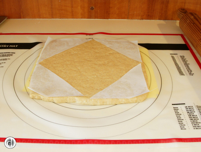 Put the triangles on the dough